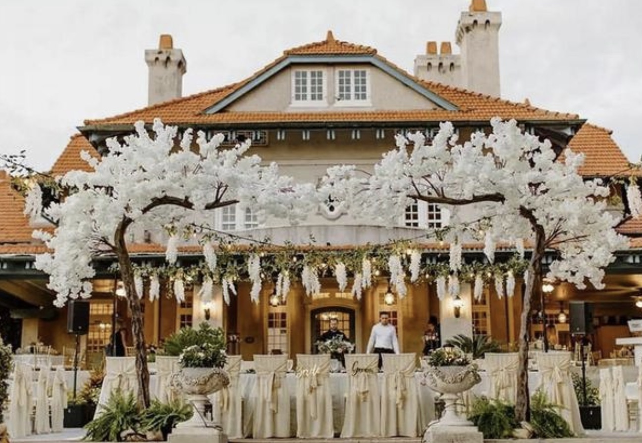 Cherry-blossom reception setup at Sydonie Mansion in Mount Dora, Florida, filmed by Labif Filmhouse